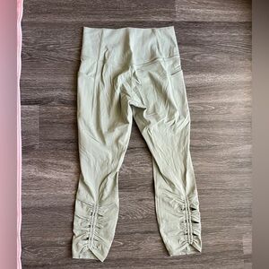 Athleta Salutation Stash Sage Green Leggings with Ruching and Pockets Size M